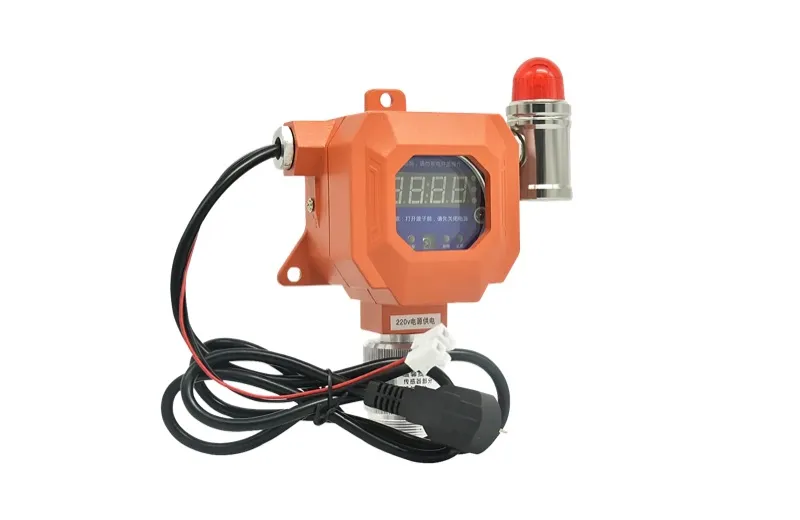 Fixed gas detector with a red beacon and cable